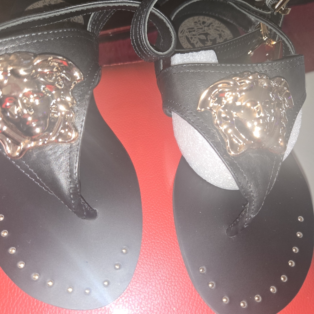 Black Sandals with Gold Medusa Detail